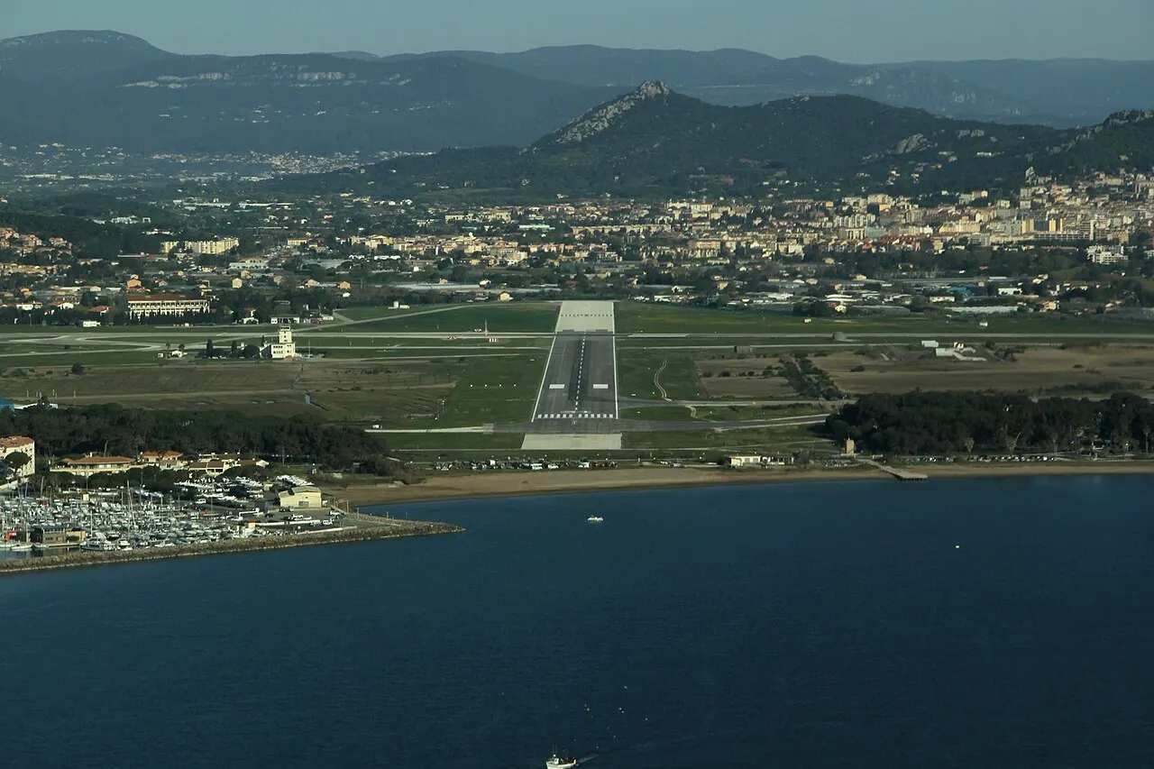 Aerial view of the airport by the sea, with Hyères behind