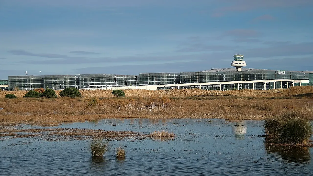 Terminal 1 and the control tower seen from the Llobregat Delta wetlands