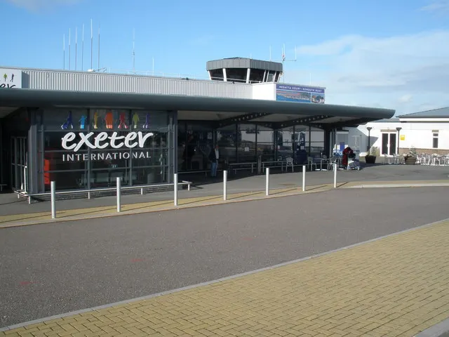 The terminal entrance with the airport sign