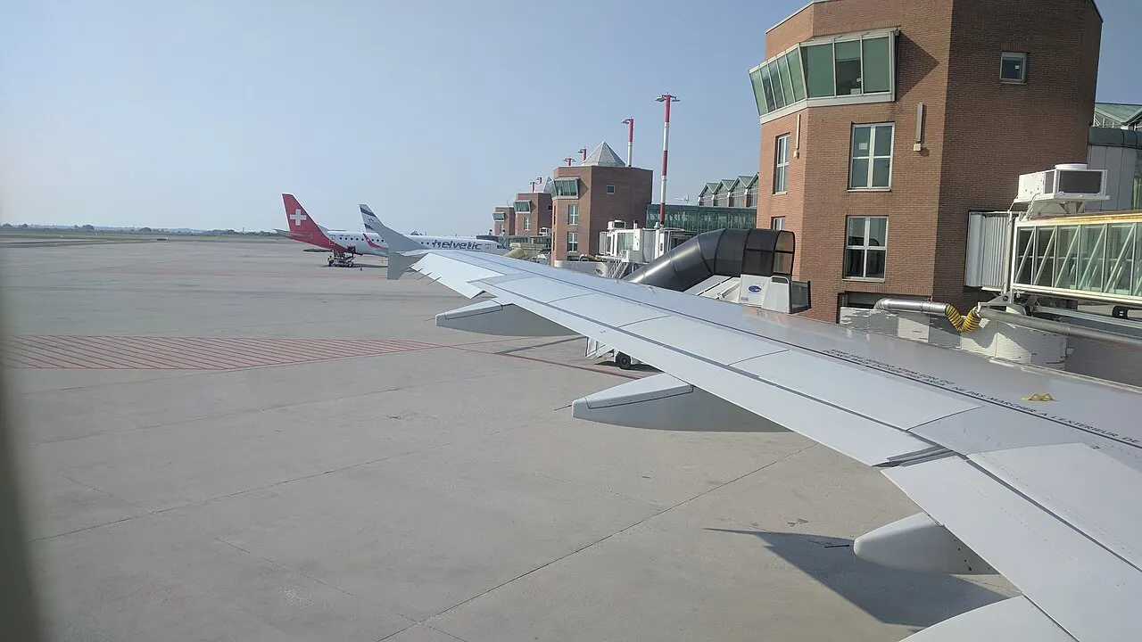 The apron and terminal seen from an aircraft window