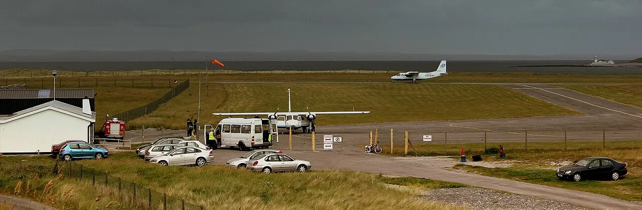 The Inishmore airstrip with a small plane and the aerodrome building