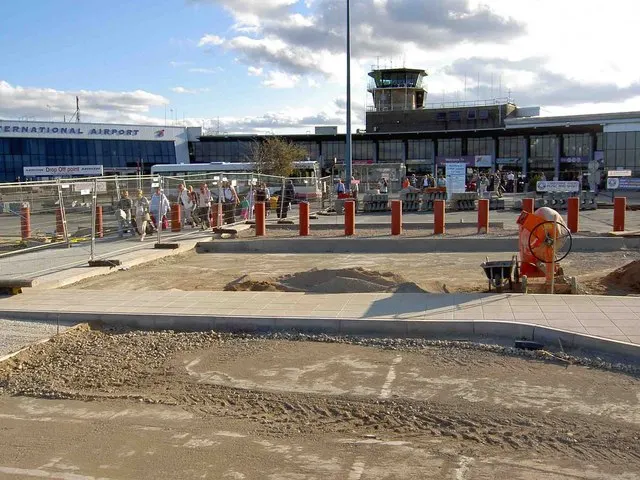 The terminal seen from the front, with the control tower behind