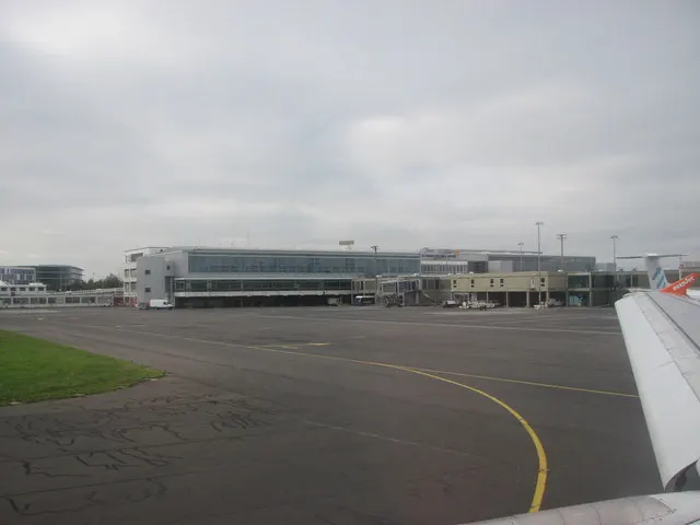 The terminal and control tower seen from the apron