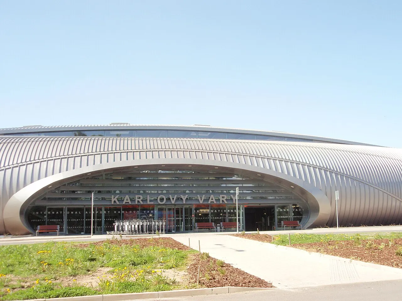 The new terminal building, with its curved roof