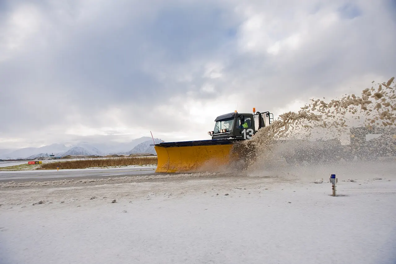 A snowplough clearing the runway
